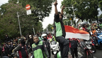 Водители Grab и GoTo в Индонезии объявили забастовку из-за низких зарплат