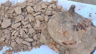 1800-летний умбон щита с кремированными человеческими костями найден на польской свалке металлолома